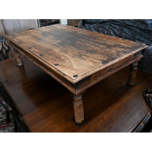 133 - Indian Jali Thakat sheesham hardwood coffee table with iron mounts and turned legs, 135 x 82 x 42 cm... 