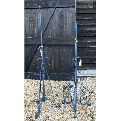 141 - Two grey painted wrought iron and brass adjustable standard lamps (2)