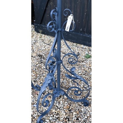 141 - Two grey painted wrought iron and brass adjustable standard lamps (2)