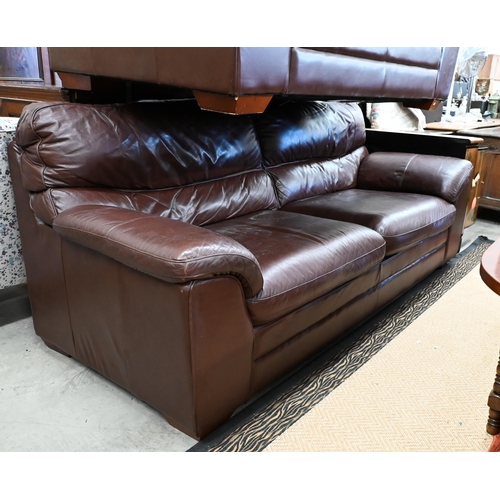 143 - A brown leather two seater sofa, 180 cm w x 95 cm d x 95 cm h, to/w a matching three seater sofa, 23... 