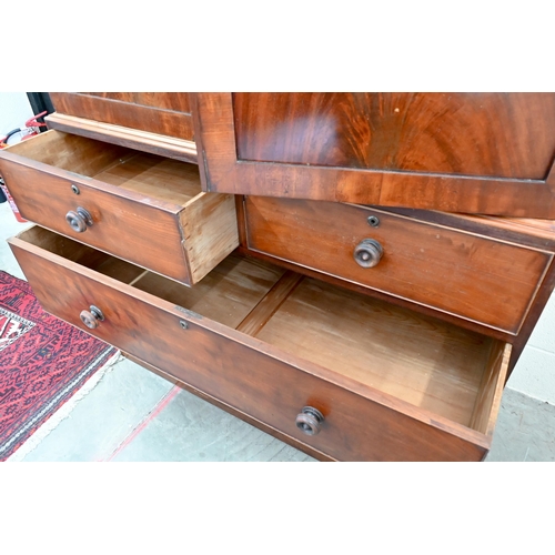 157 - A 19th century mahogany wardrobe (converted from a linen press) with panelled doors enclosing hangin... 