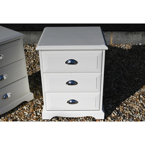 158 - A pair of white painted three drawer bedside chests with chromed cup handles (2)