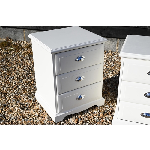 158 - A pair of white painted three drawer bedside chests with chromed cup handles (2)