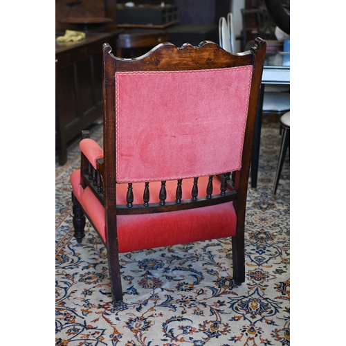 160 - An Edwardian stained and carved walnut armchair, red dralon button back upholstery