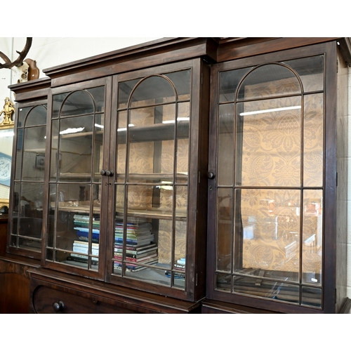 163 - A 19th century mahogany breakfront library secretaire bookcase, prov.: Avington Park, Hampshire, gla... 