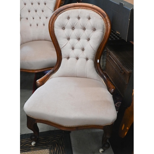 165 - A Victorian mahogany framed armchair with champagne button-backed dralon upholstery to/w a side chai... 