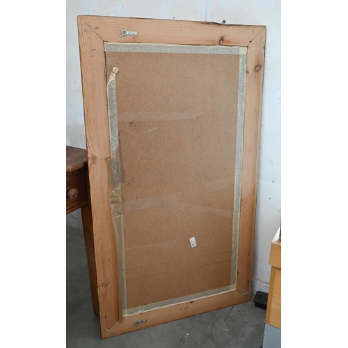 171 - A large rectangular wall mirror in stained pine frame, 140 cm x 80 cm 