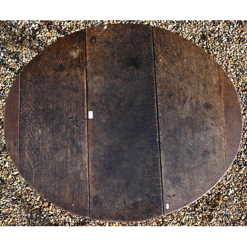 175 - An 18th century oak drop leaf dining table on gate-leg action turned supports