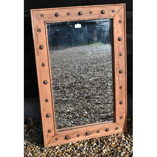 176 - A pair of rectangular modern wall mirrors in hardwood frames with studded decoration, 91 cm x 60 cm ... 