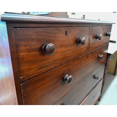 197 - A large Victorian mahogany chest of two short over three long drawers with turned handles (one missi... 