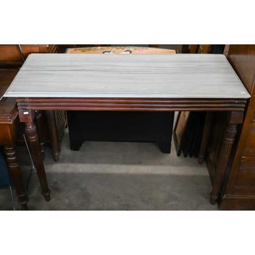 199 - A marble top console table on mahogany base with turned and reeded supports, 122 cm wide x 51 cm dee... 