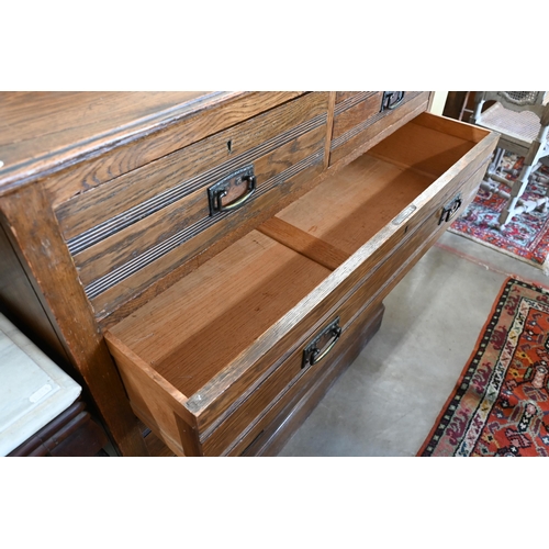 206 - A Harris Lebus, London oak Arts and Crafts chest of two short over three long drawers, 108 cm wide x... 