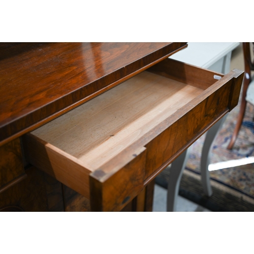 220 - A Victorian burr walnut chiffonier with two drawers over arched platform cupboard doors raised on pl... 