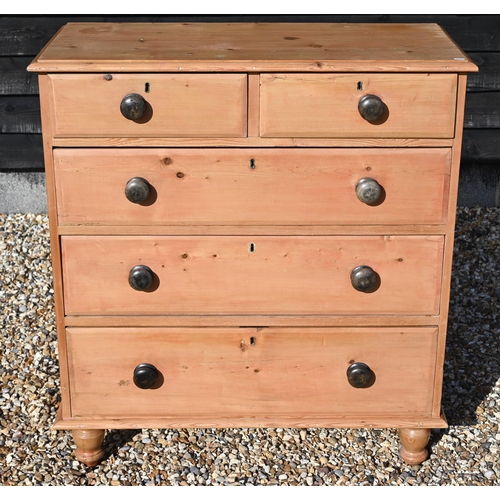 226 - A waxed Parana pine chest of two short over three long drawers with worn ebonized turned handles, on... 