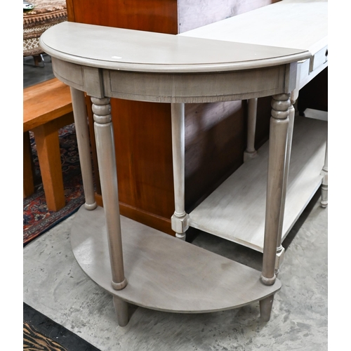 227 - A grey painted two-tier demi-lune hall table, 80 cm wide x 30 cm deep x 80 cm high