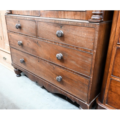 233 - A 19th century figured mahogany linen press, the panelled doors with column mouldings enclosing four... 