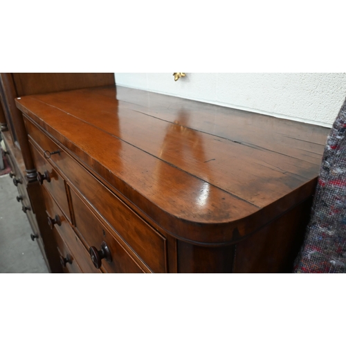 234 - A large Victorian mahogany chest with shallow drawer over two short and two long standard drawers wi... 