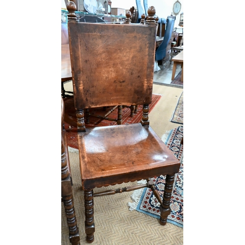 248 - A set of seven 17th century style oak framed dining chairs in the Cromwellian style, with brown leat... 