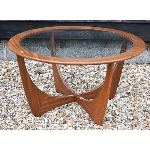 279 - A G-Plan teak 'Astro' coffee table, circular inset glass top on shaped base, 84 cm diam x 46 cm high... 