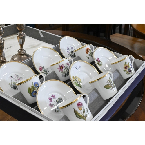 31 - A boxed set of six Royal Worcester floral-printed coffee cups and saucers to/w a pair of loaded silv... 