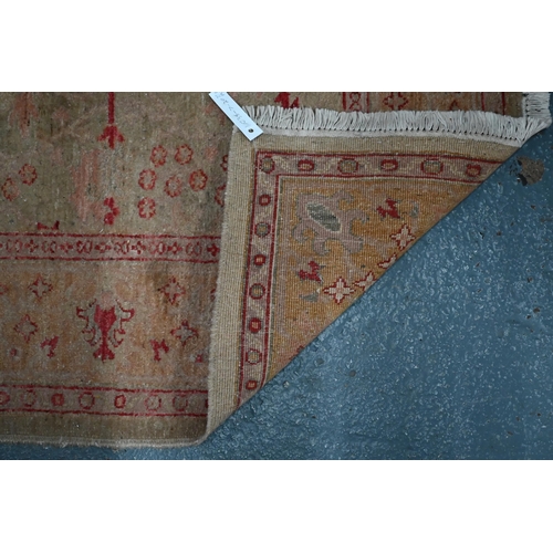 396 - An Indian Agra camel ground carpet, 238 cm x 191 cm