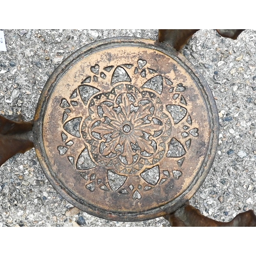 403 - A pair of cast iron Britannia style circular tavern tables with wooden tops (2)