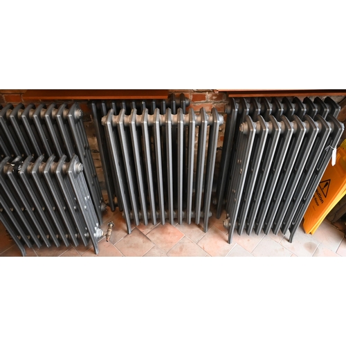 410 - Six contemporary cast iron column radiators, various sizes (6)