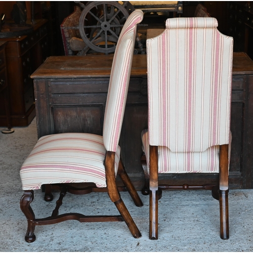 417 - A pair of well upholstered walnut framed continental hall chairs in the 18th century style (2)