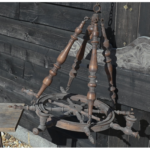 419 - French ox yoke to/w an antique turned fruitwood spinning wheel hanging candelabra, a carved oak pane... 