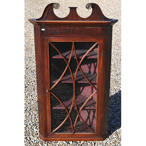 421 - A George III mahogany astragal glazed hanging corner cabinet, 120 cm h o/a