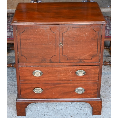 431 - Victorian mahogany commode cabinet with a pair of cabinet doors over two long drawers, on shaped bra... 