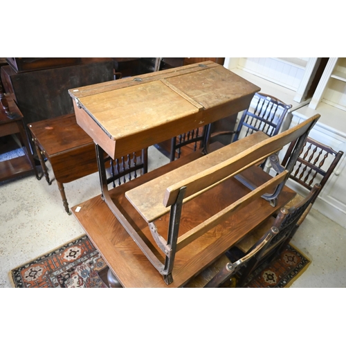 434 - A vintage steel framed oak twin bench seat school desk with twin hinged slope tops, 102 x 74 x 67 cm... 