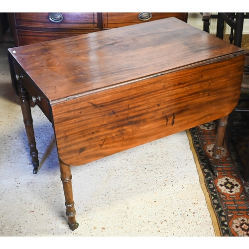 436 - A Victorian mahogany drop leaf Pembroke table with frieze drawer to each end, on turned legs to bras... 