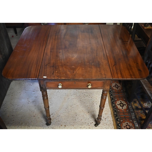 436 - A Victorian mahogany drop leaf Pembroke table with frieze drawer to each end, on turned legs to bras... 