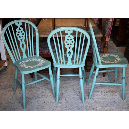 442 - A trio of wheelback dining chairs painted blue to/w a fruitwood carver chair (4)