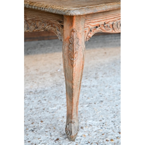 461 - An old stripped pine part carved coffee table on cabriole legs, 140 x 70 x 46 cm