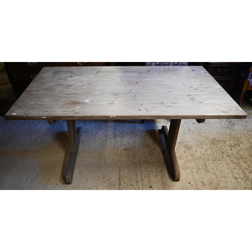 462 - An old pine trestle table, 150 x 90 x 67.5 cm h