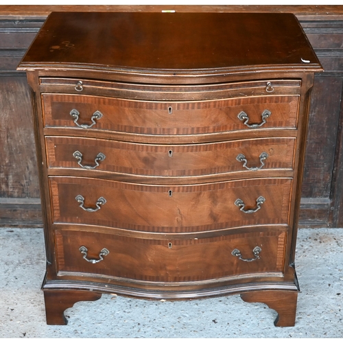 471 - A reproduction Georgian style serpentine chest of four long graduated drawers beneath a brush slide,... 