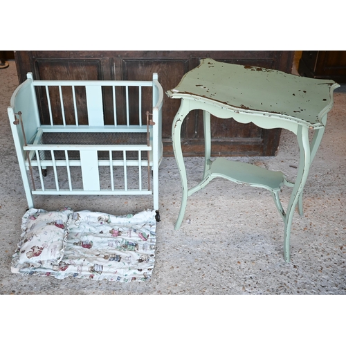 476 - A vintage child's doll cot to/w a painted occasional table (2)