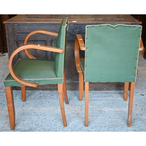 483 - A pair of green vinyl upholstered beech framed armchairs circa 1950 (2)