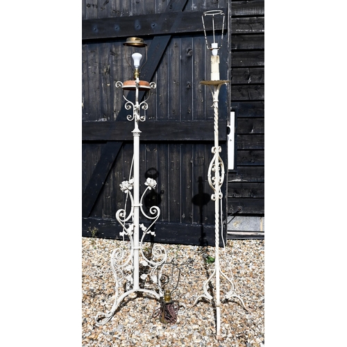 500 - Two antique wrought iron/steel standard lamps, converted from an oil lamp and later painted, to/w a ... 