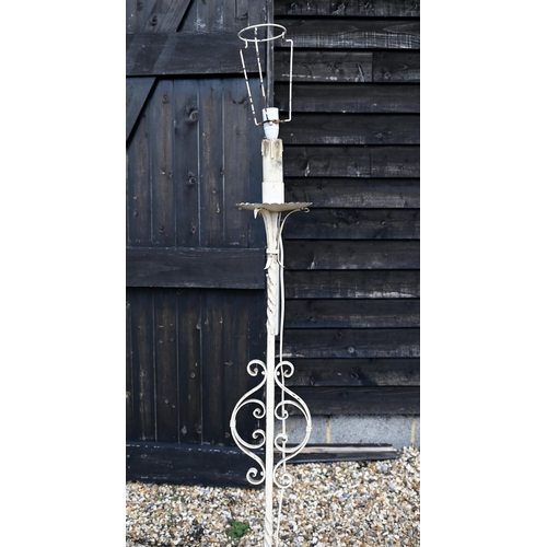 500 - Two antique wrought iron/steel standard lamps, converted from an oil lamp and later painted, to/w a ... 