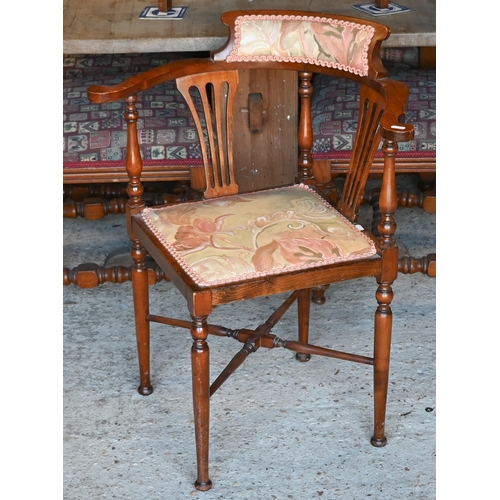 502 - An Edwardian corner elbow chair