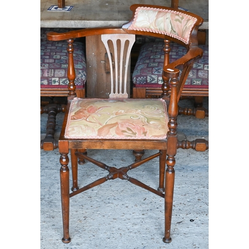 502 - An Edwardian corner elbow chair