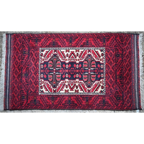 506 - An old Afghan Belouch, kelim ends, red ground, 165 x 98 cm