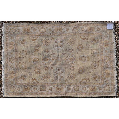 509 - A contemporary Agra rug, yellow/gold ground with geometric floral design, 180 x 120 cm