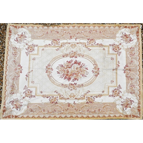 511 - A traditional Savonnerie design woven rug, ochre yellow with dusky red design, 230 x 160 cm