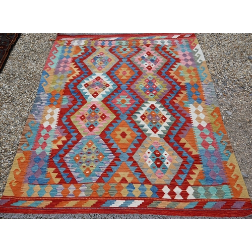 516 - A contemporary Turkish multi-coloured geometric design wool kelim, 199 x 153 cm