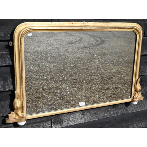 527 - An antique over mantel mirror in moulded gilt wood frame, 104 cm w x 63 cm h 