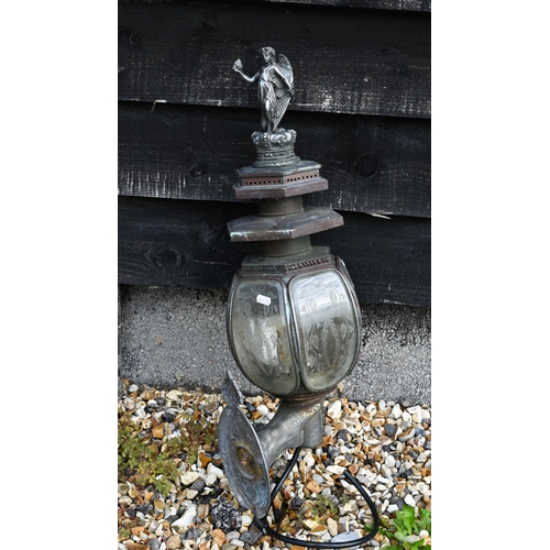 86 - Antique metal large coach-lamp, surmounted by a cast angel on crown, the shade with foliate-etched g... 